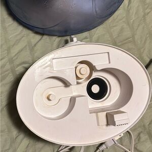 White and blue Humidifier.